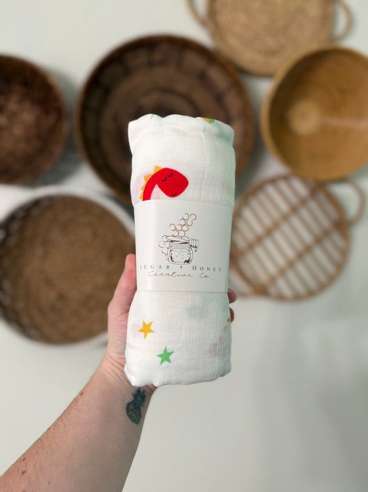 Rainbow Rex Muslin Swaddle